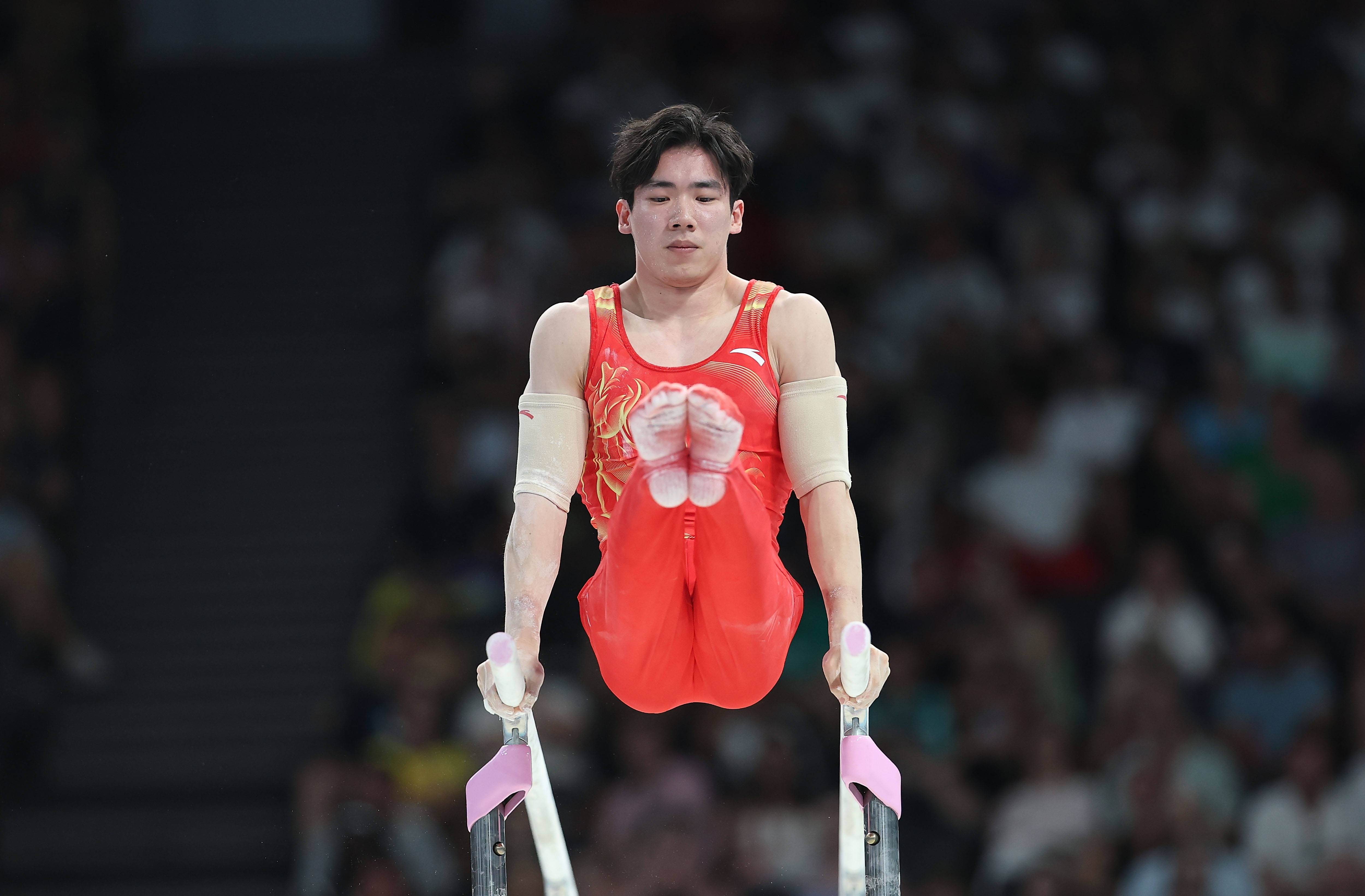 雷火电竞网址-体操男子双杠决赛中国选手夺得冠军